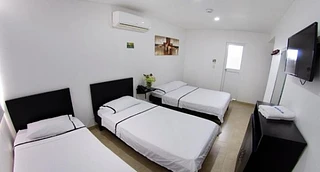 Habitación triple con aire